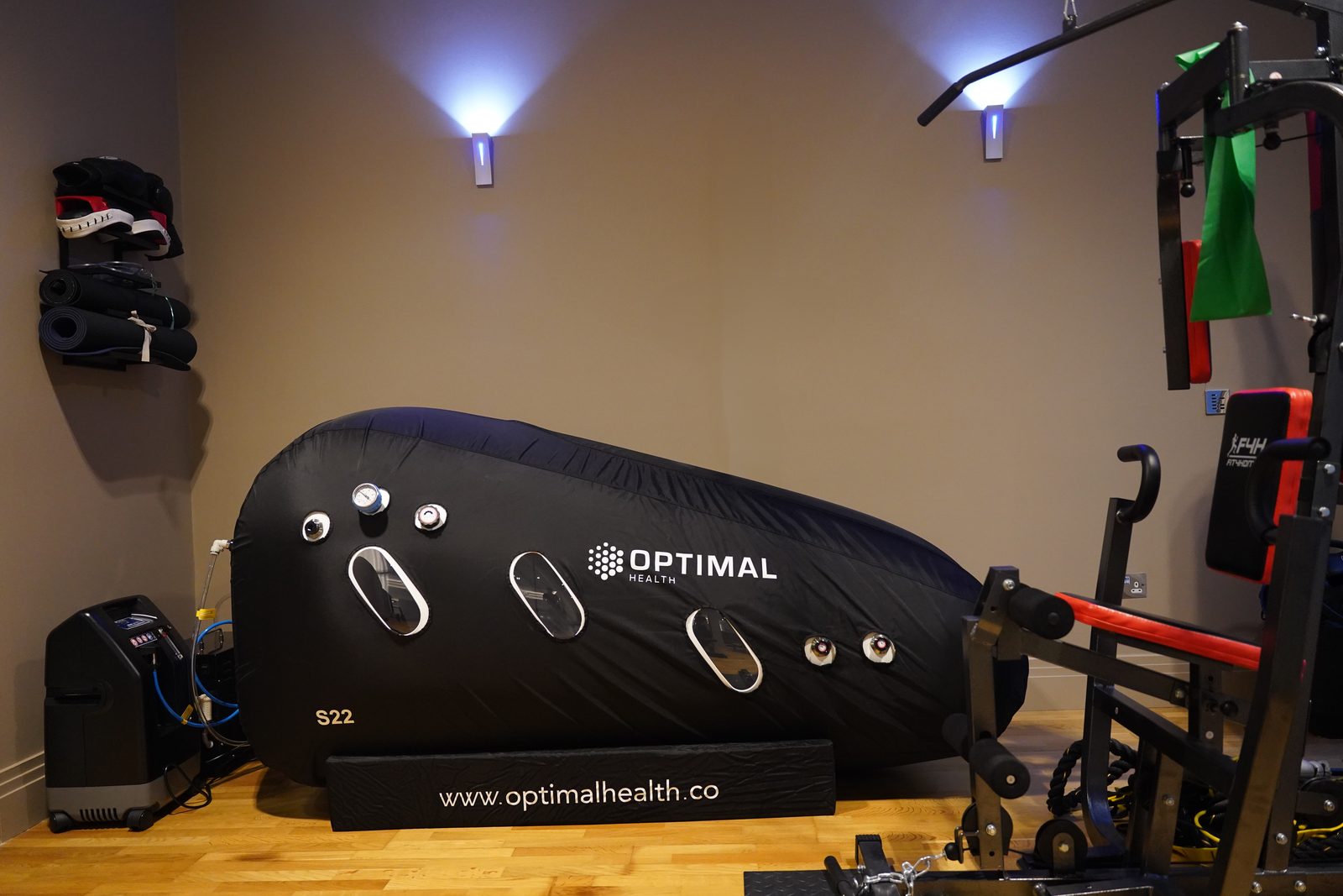 The HBOT Softshell Lay Down set up in a home gym